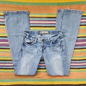 Distressed Low-Rise Bootcut Jeans